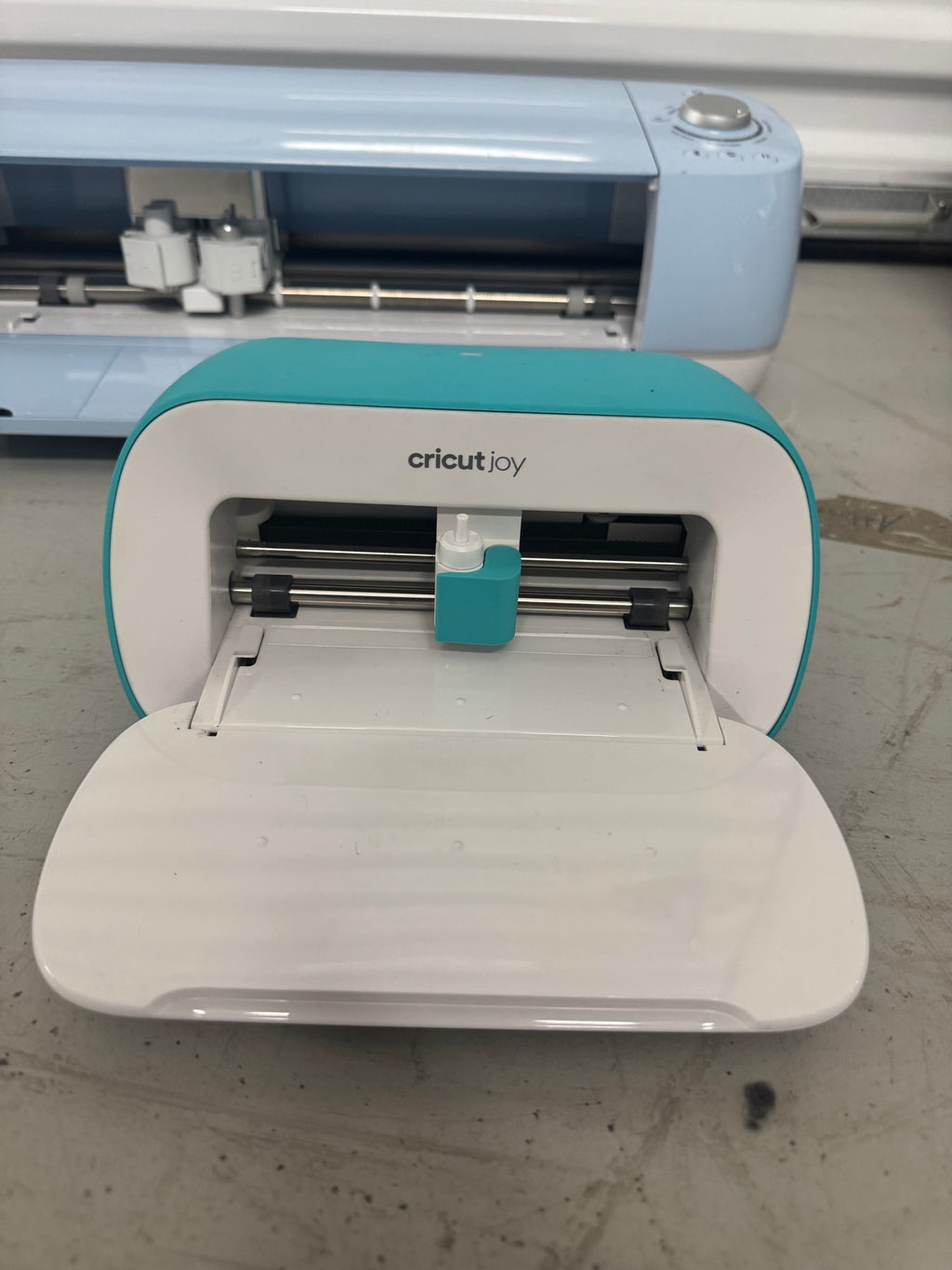 Middle drawer containing Cricut brand boxes including Smooth Vinyl and other products