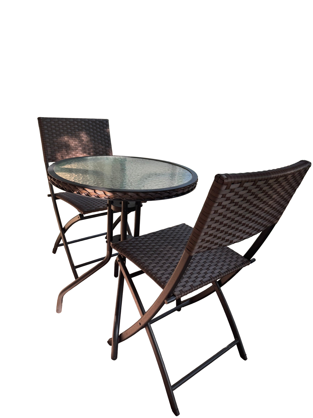 Round glass-top bistro table with two espresso wicker folding chairs in a sunroom