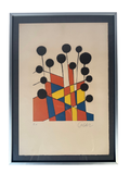 Colour lithograph of black discs on stems over a red, yellow and blue mosaic, framed under glass in a silver aluminium frame on a black linen mat