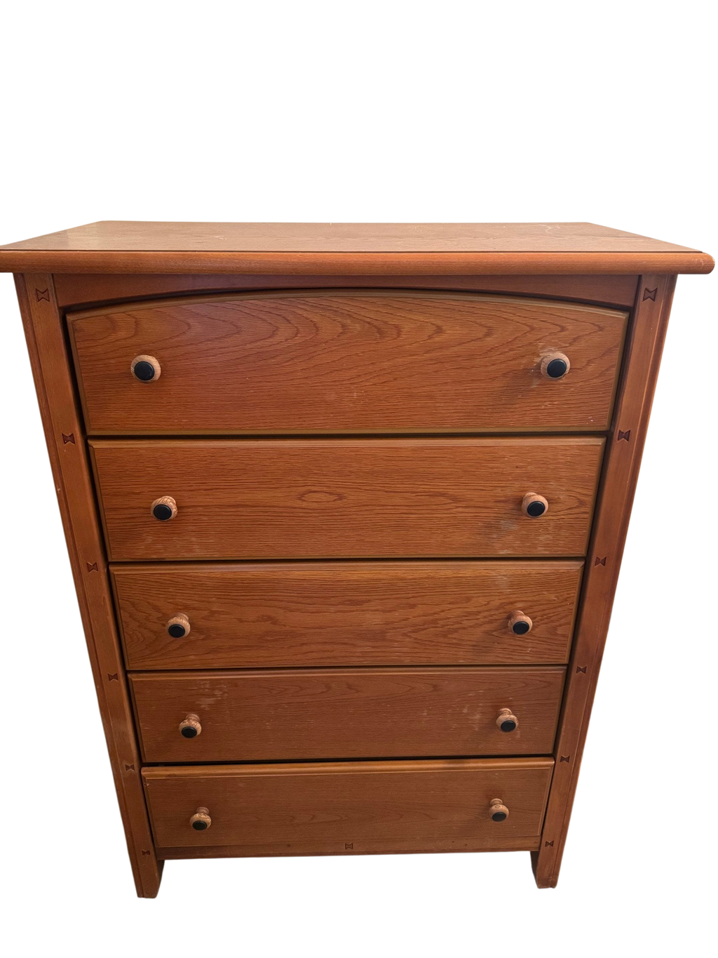 Five-drawer chest in a warm wood finish