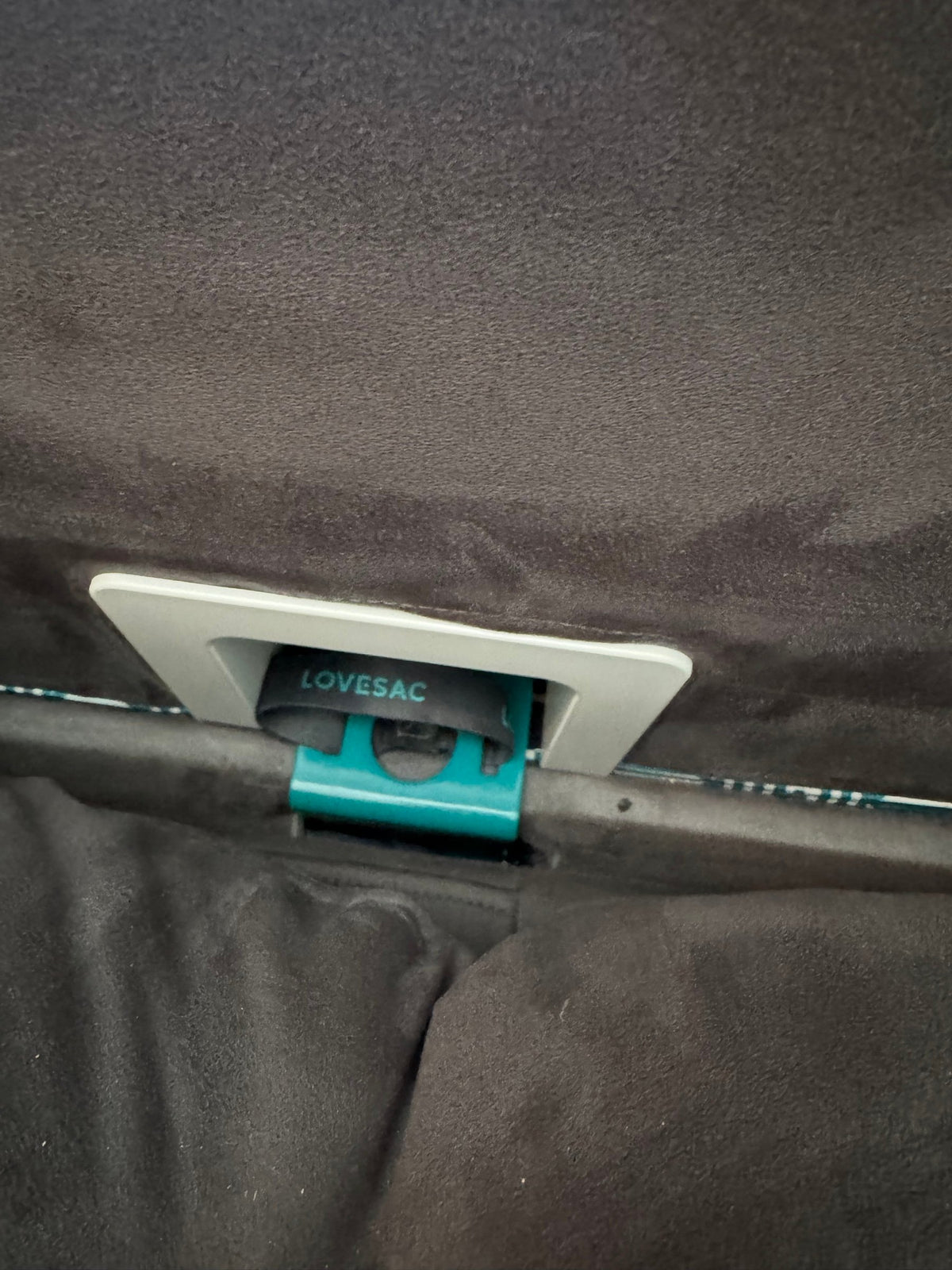 Lovesac power hub with outlets inside a Sactional seat