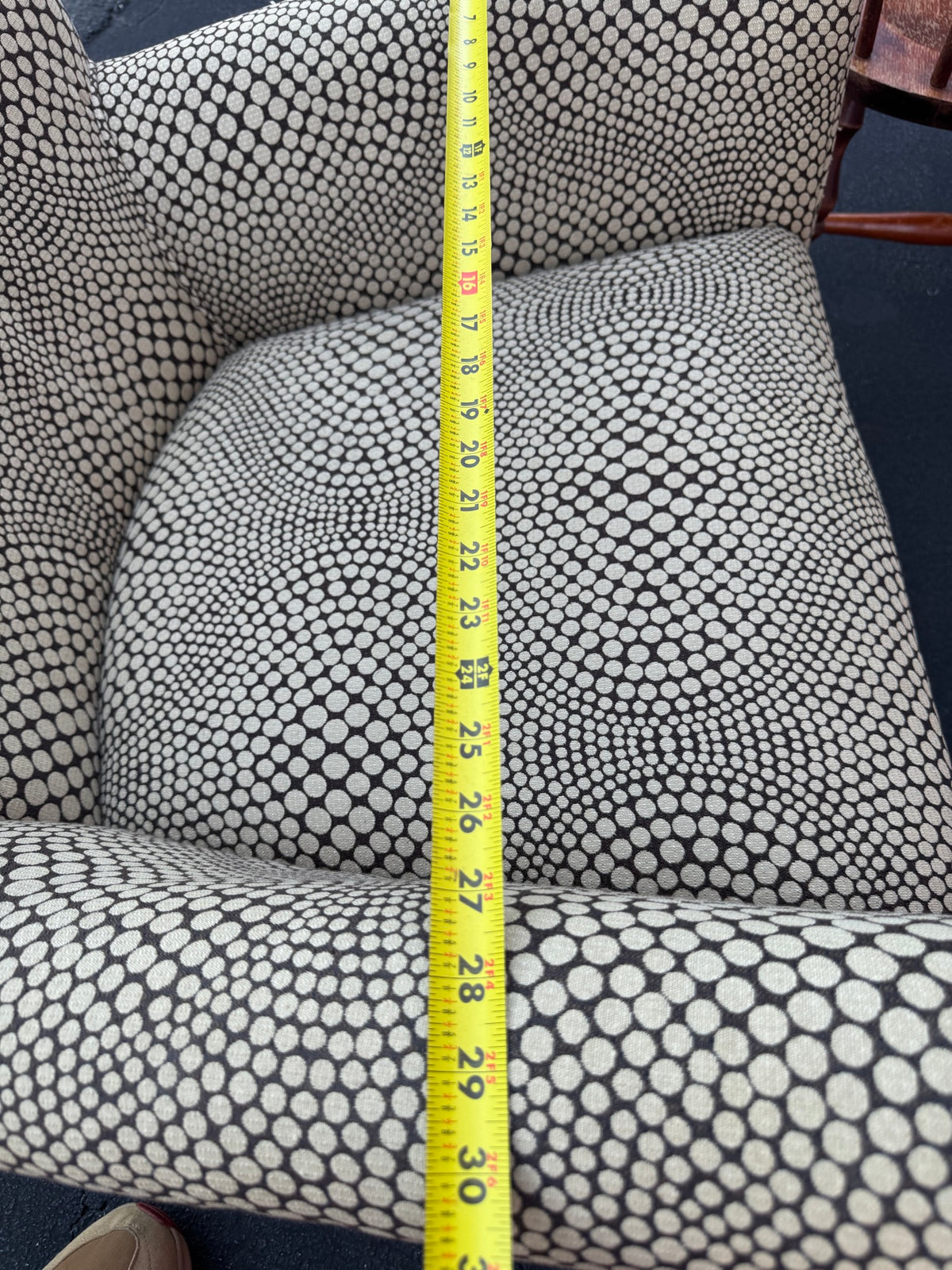 Care label on underside showing manufacturer information and cleaning instructions
