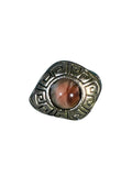 Costume Ring Lot of Four Including Greek Key Cabochon — main image on a white ground