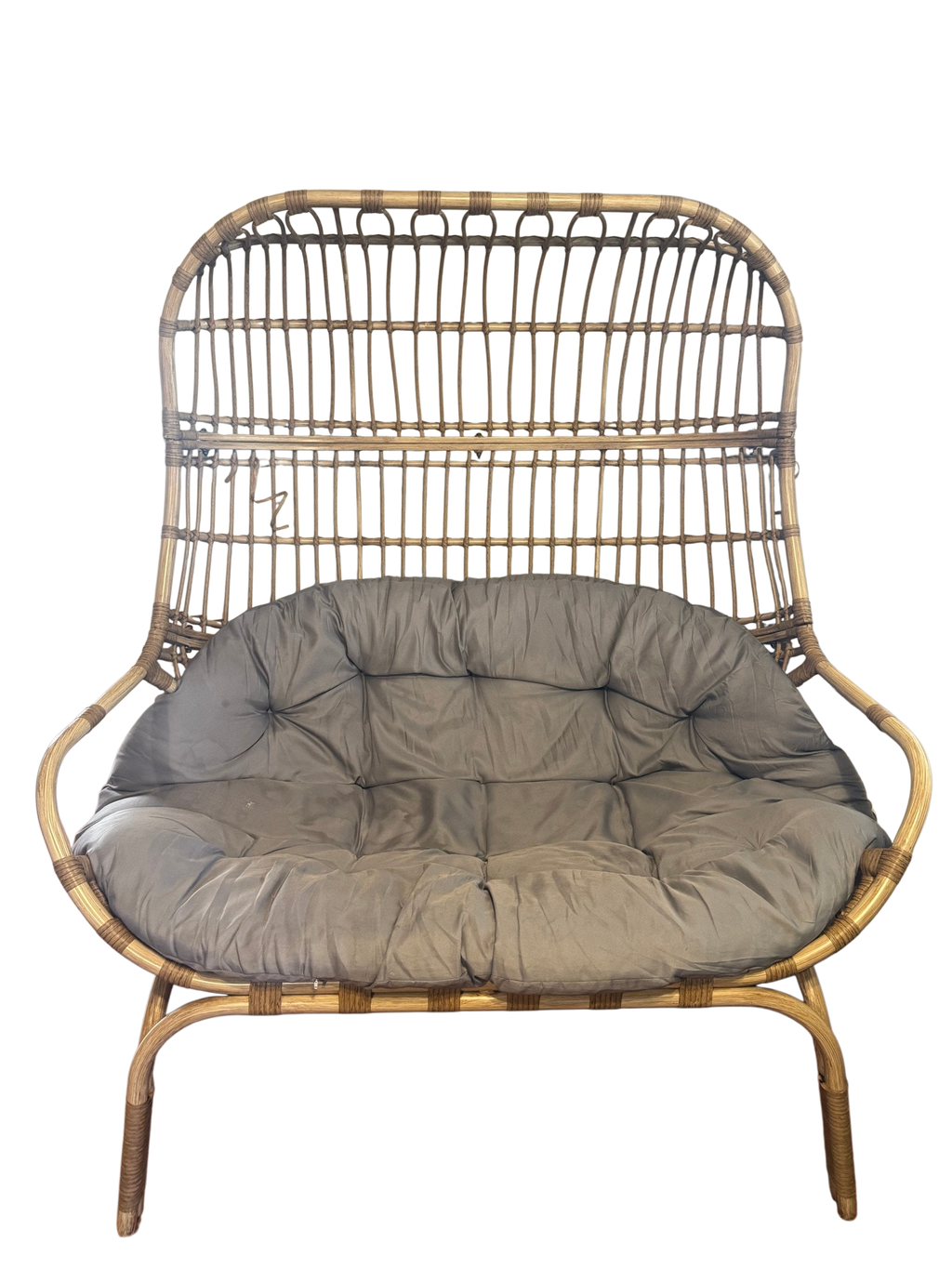 Rattan loveseat with grey tufted cushion, front view