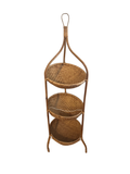 Three-tier rattan basket stand in a corner