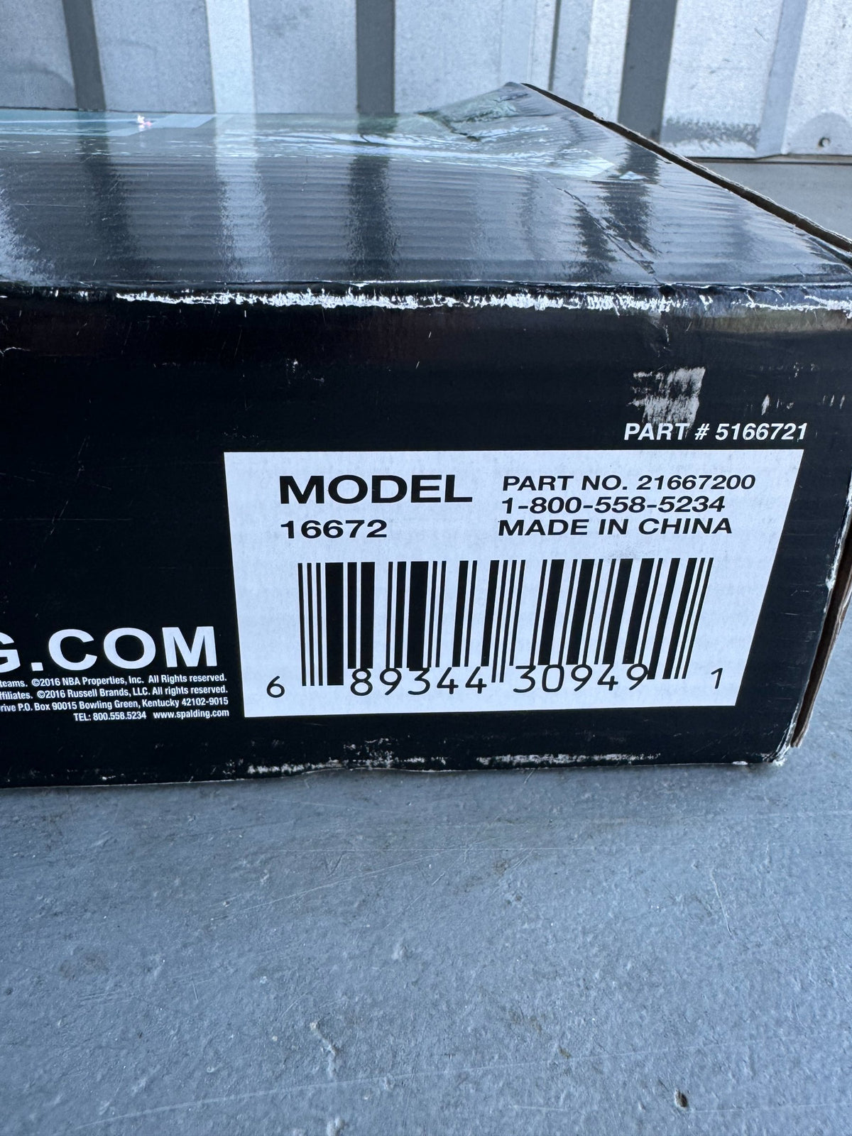 Black foam board pad with wet surface and aluminum trim edge, Model 16672 label visible on underside with barcode