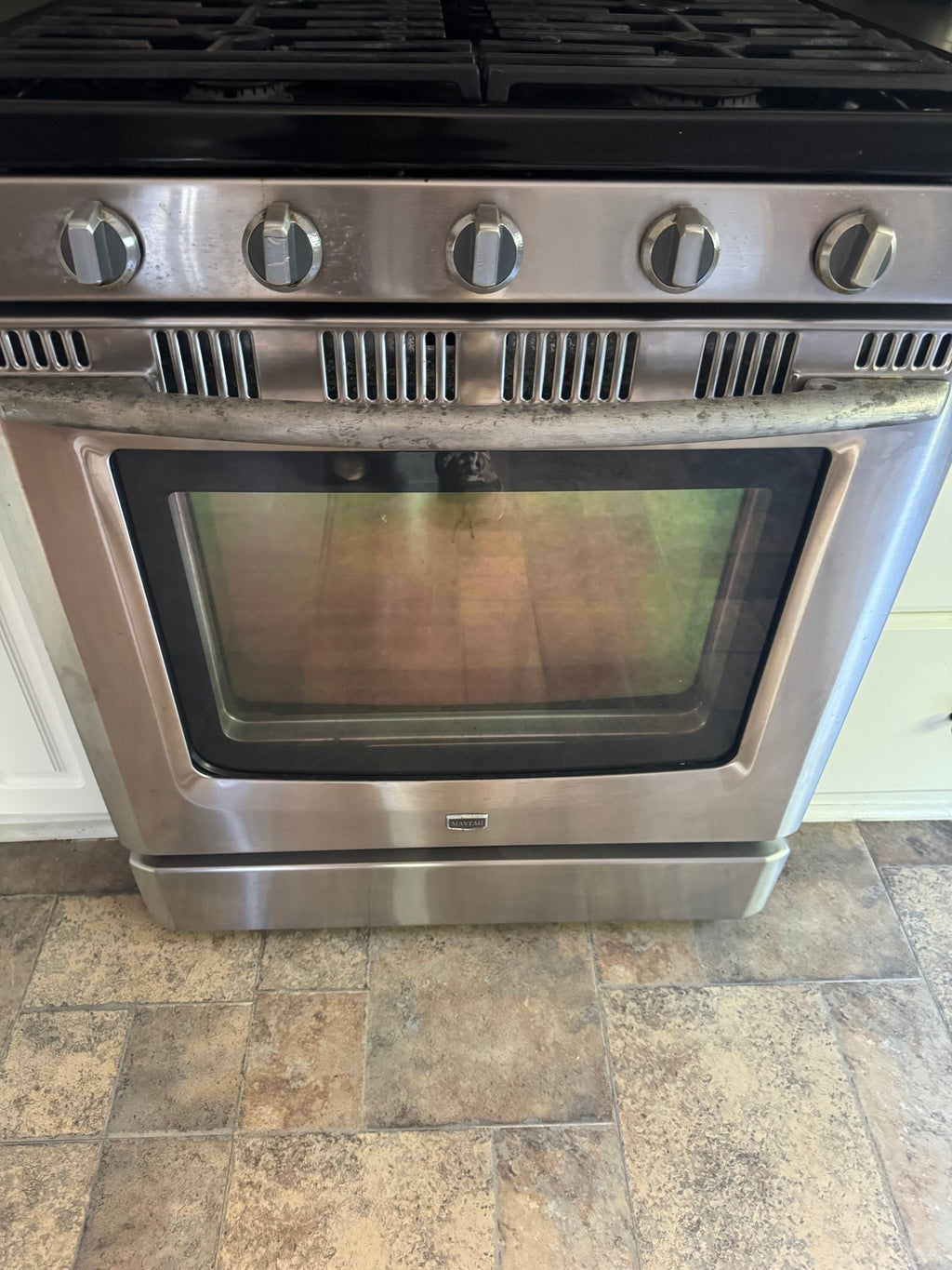 Oven front and storage drawer