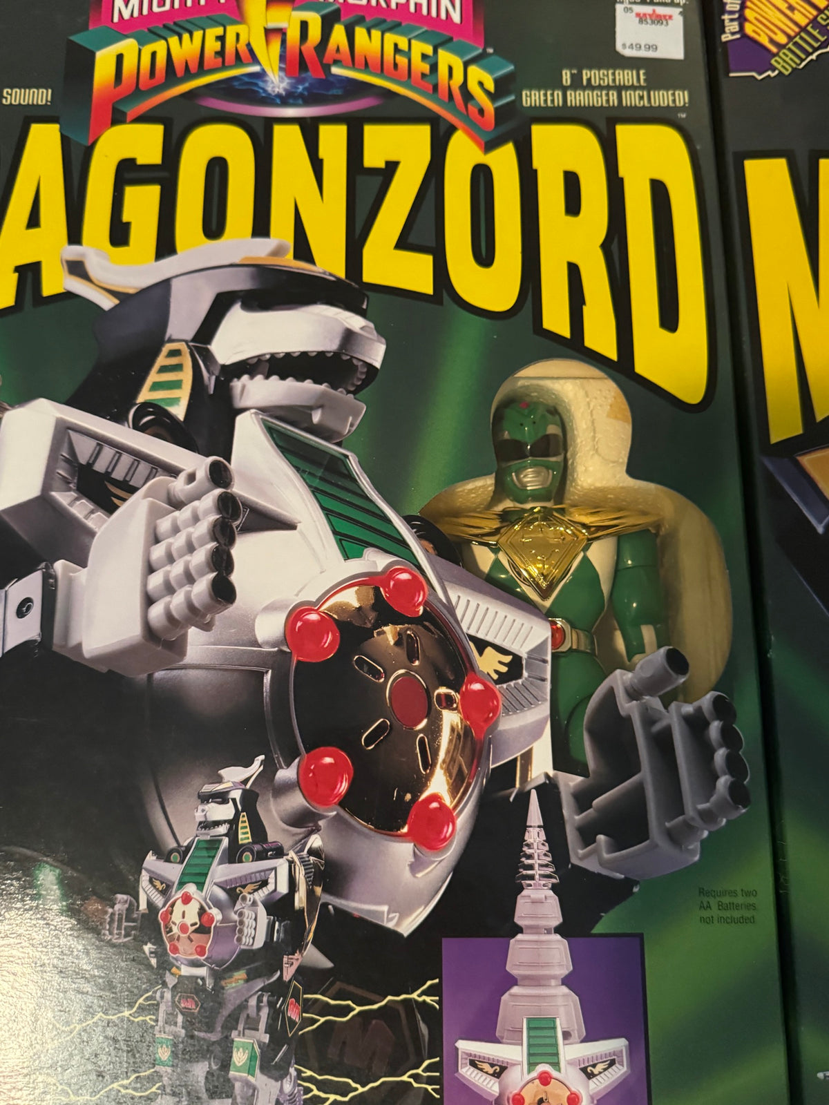Close-up of Dragonzord box front artwork with Green Ranger figure