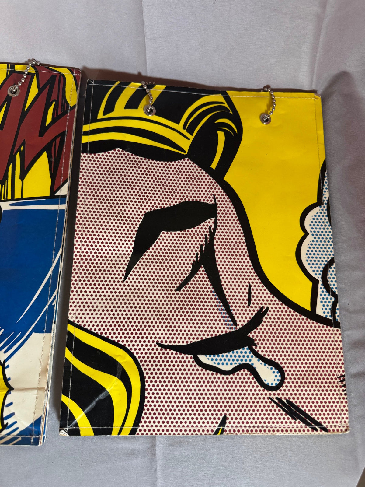 Close view of comic-panel artwork on a bag