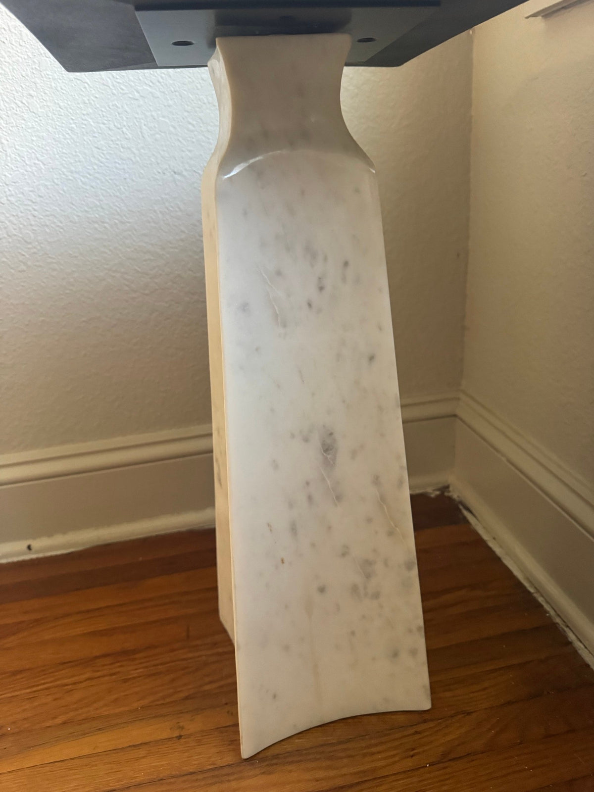 Side view of the marble pedestal base