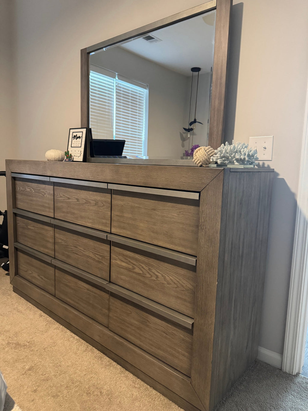 Nine-drawer gray oak dresser with matching mirror