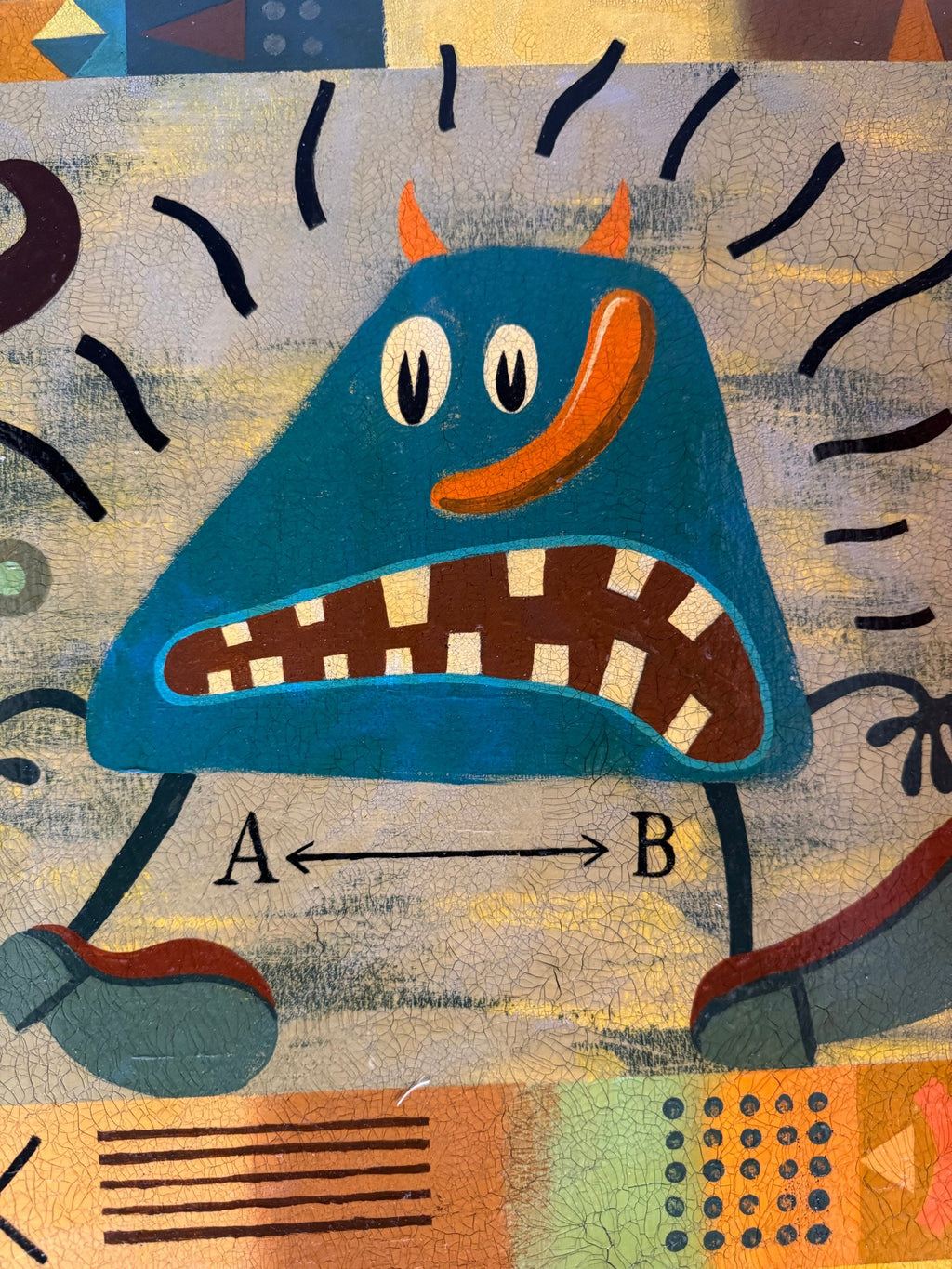 Detail of the monster and the letters A and B