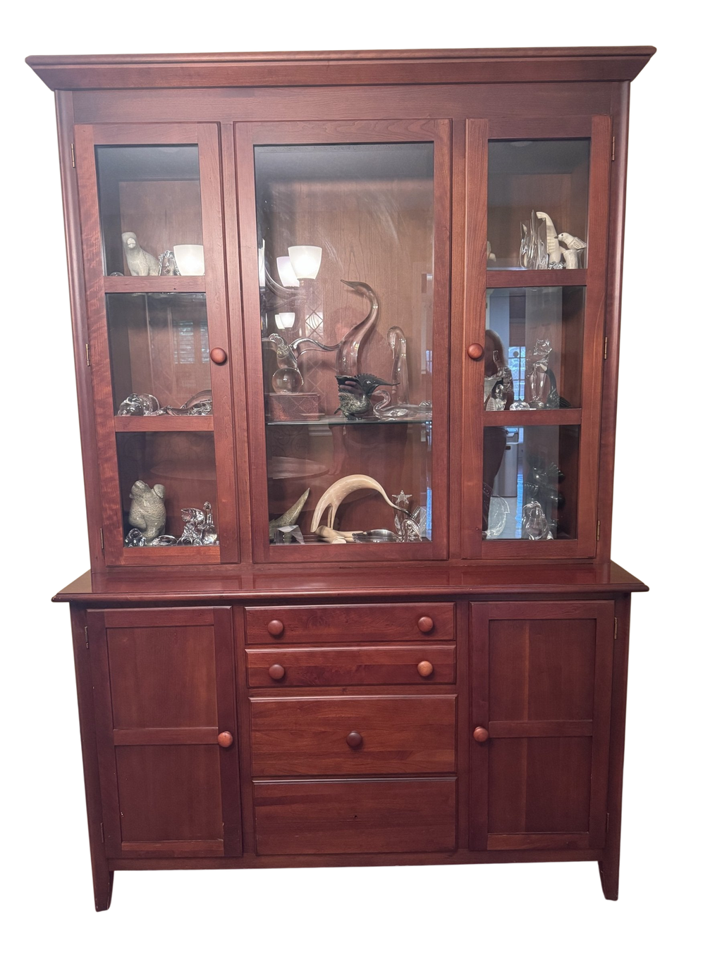 Drexel Studio cherry china cabinet seen from the front with three glass doors