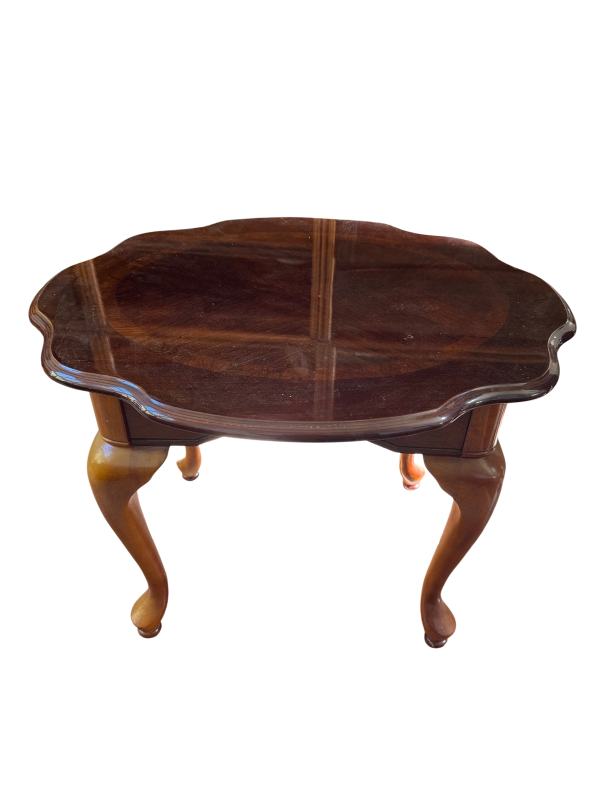 Scalloped oval side table on cabriole legs