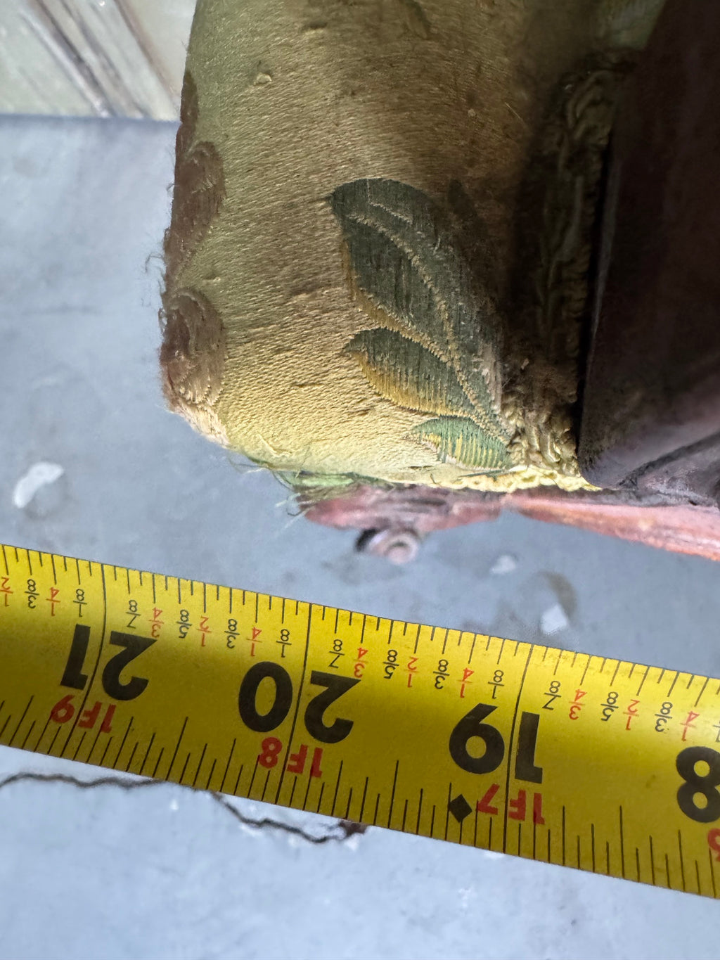 Tape measure against the seat, recording the seat depth