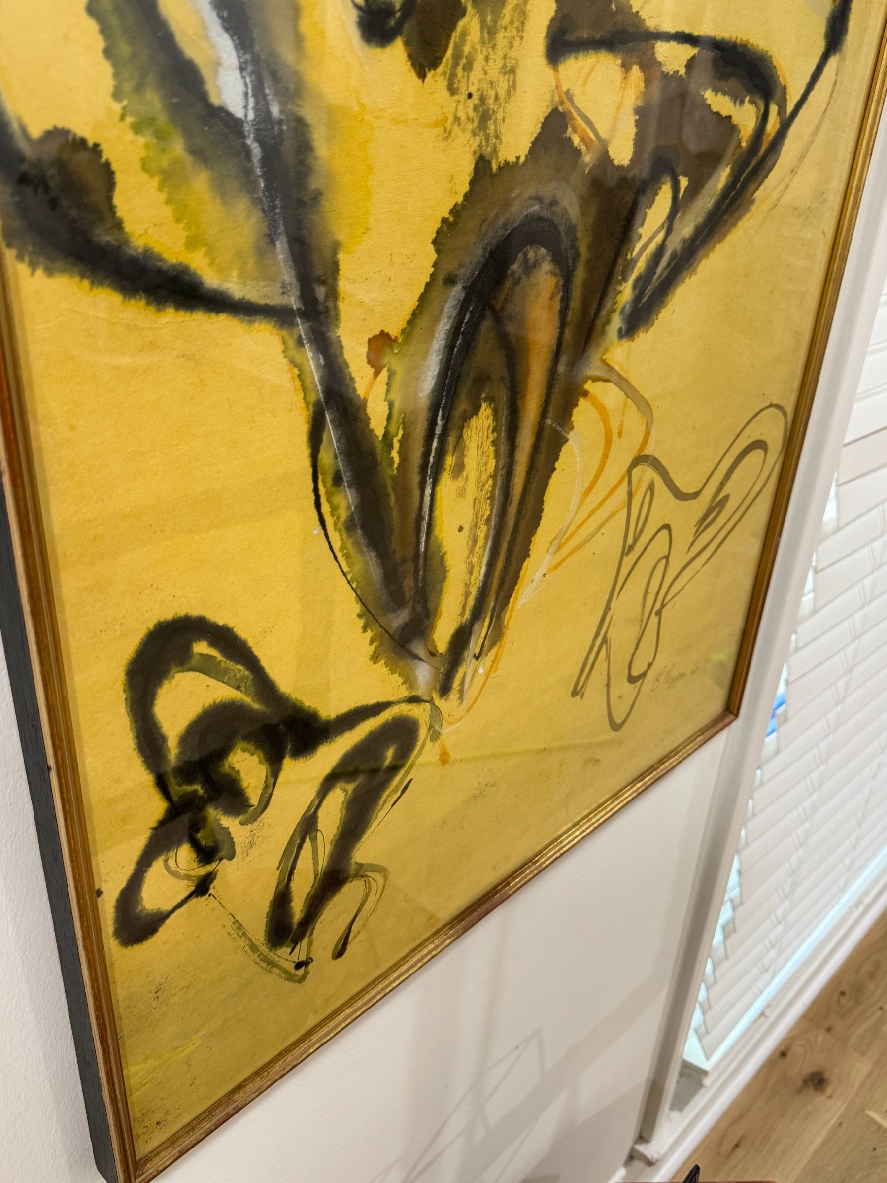 Close-up detail of central abstract forms, black ink strokes and yellow watercolor washes creating organic shapes
