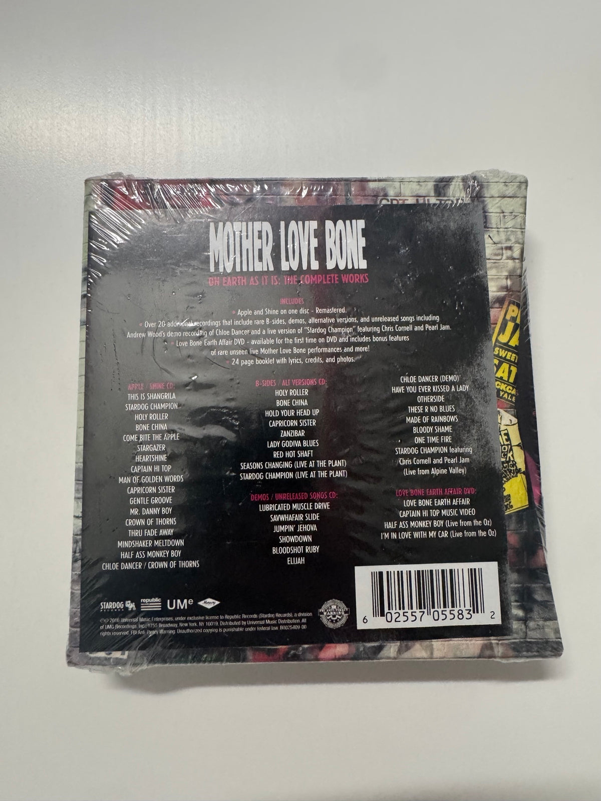 Back cover of sealed box set displaying complete track listing across multiple discs, bonus features description, and barcode