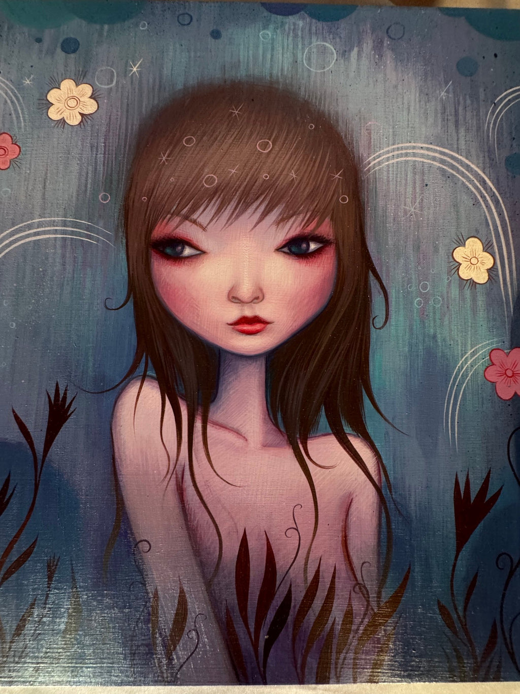 Close view of the girl's face and flowers