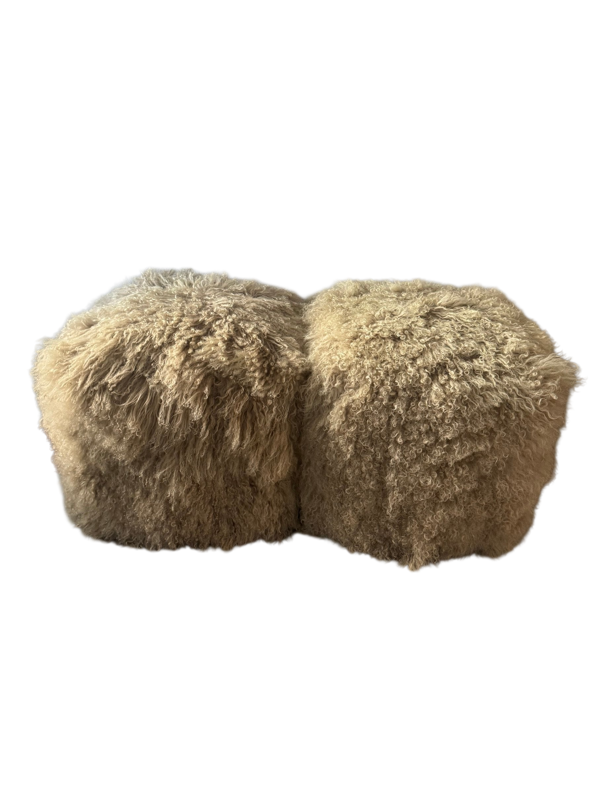 Pair of tan Mongolian lamb fur cube poufs side by side