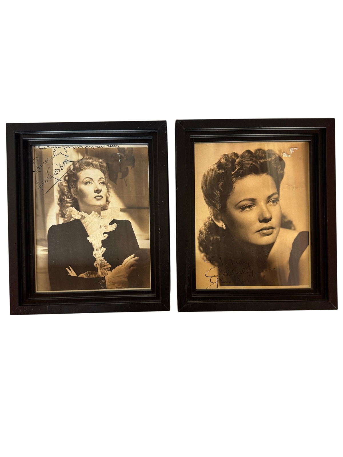 Pair of framed vintage studio portrait photographs, straight-on