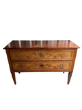 Full front view of antique oak commode with two carved drawers and tapered legs