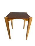 Square side table with walnut-tone top and tapered oak legs
