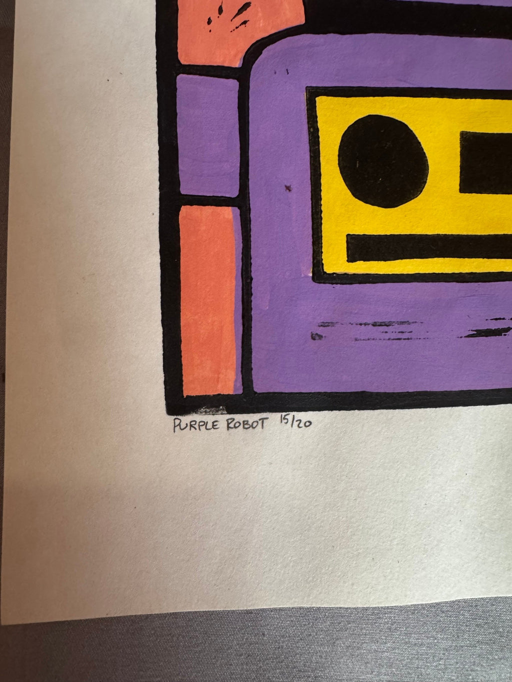 Pencil title and edition number 15/20 on the robot linocut