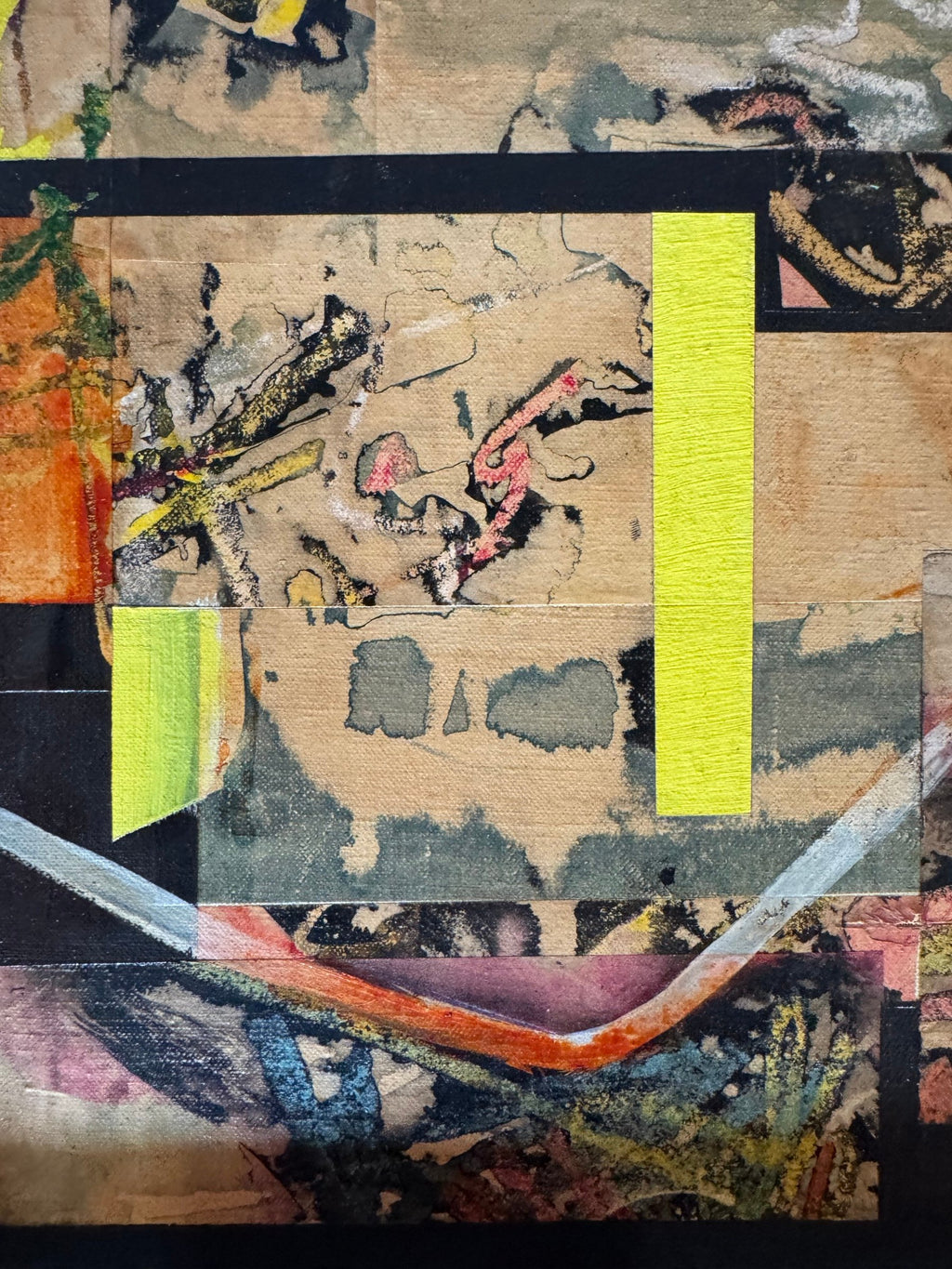 Detail of the layered papers and yellow strip