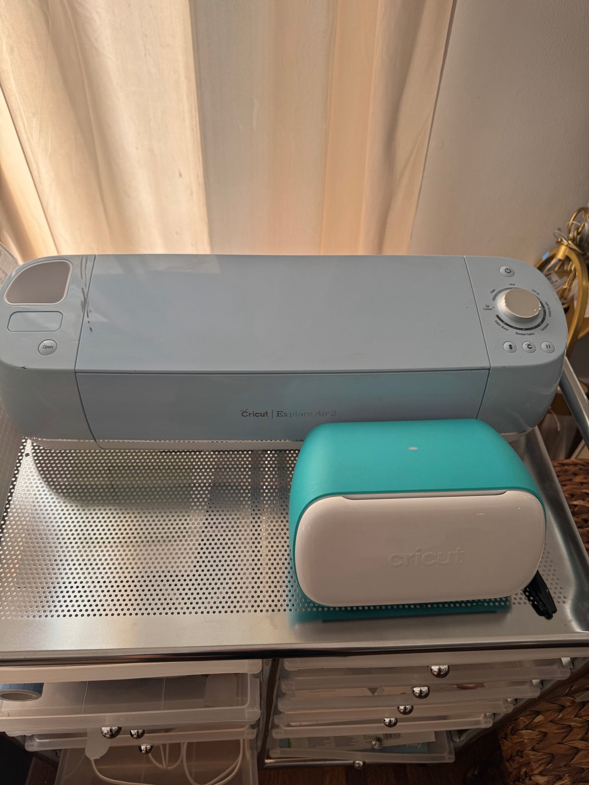 Cricut Explore Air 2 from front showing closed material tray and white end caps