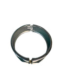 Costume Bracelet Lot Two Wide Cuffs and a Hinged Bangle — main image on a white ground