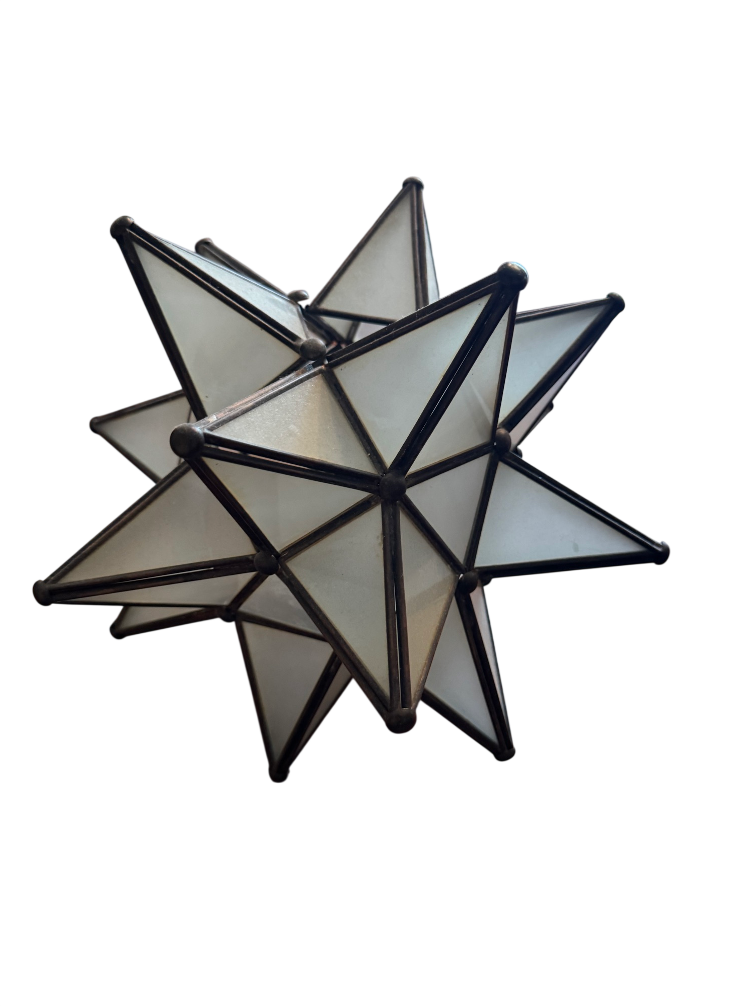 Moravian star candleholder with frosted glass triangular panels and dark metal frame, three-dimensional geometric form