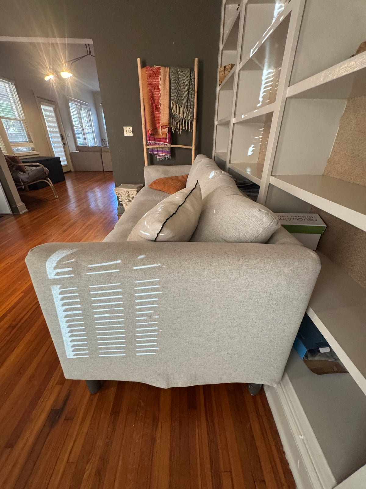 Side view of the sofa arm and base