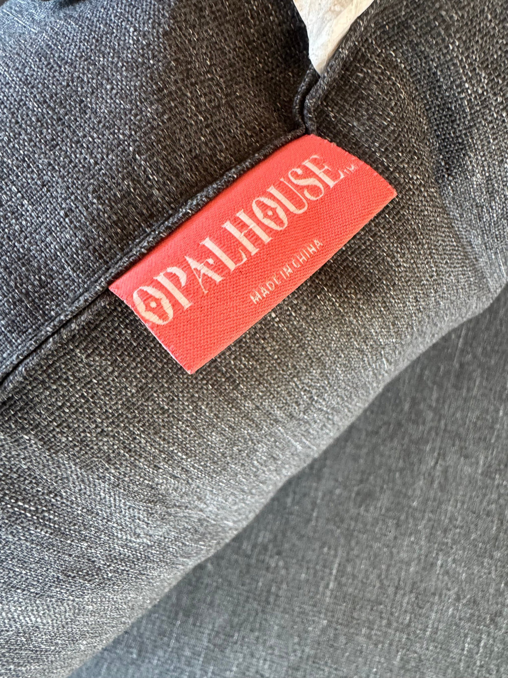 Opalhouse tag on a cushion
