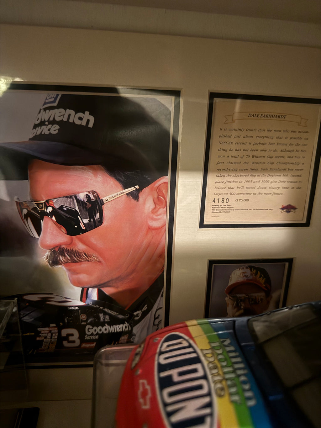 Close-up of the framed Tom Bates Dale Earnhardt print and plaque, numbered 4180 of 25,000