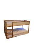 Pine and white kids bed frame set up as a low loft