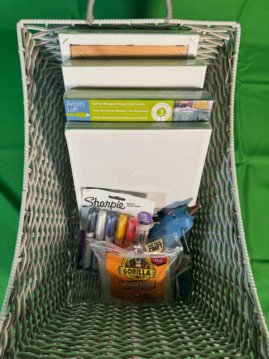 Art Supply Lot Canvases Panels and Tools in Wicker Basket — detail view 1