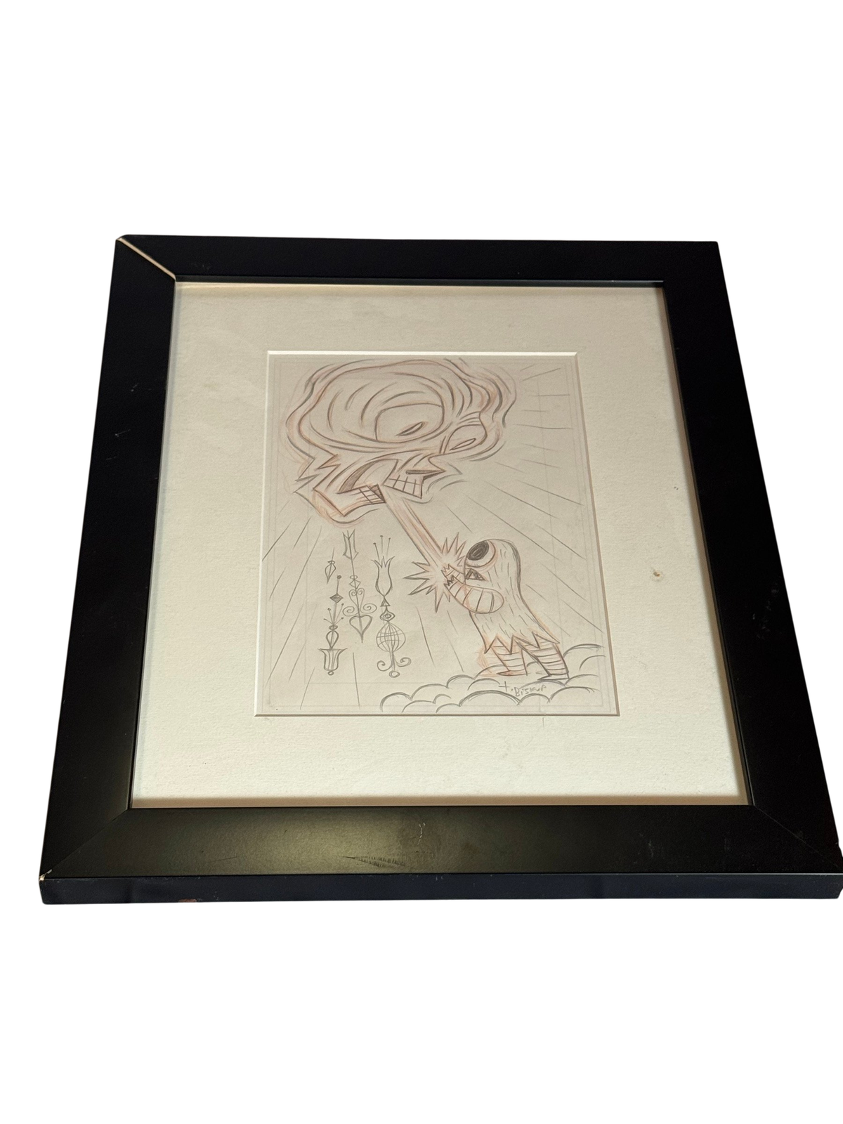 Framed pencil drawing of an eye and a small figure on clouds in a black frame with white mat, straight-on view