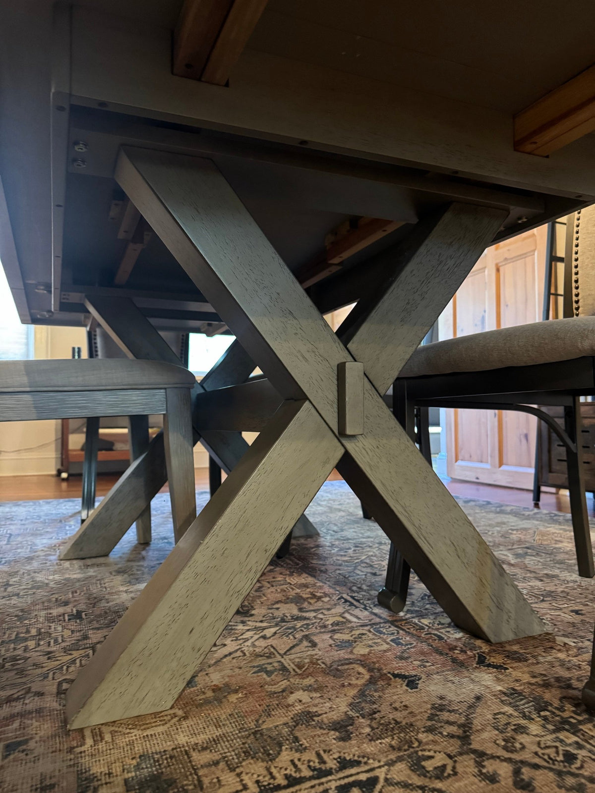 X-trestle base of the table