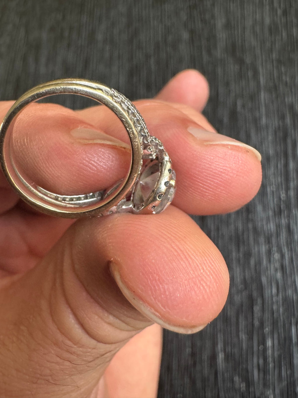 Reverse angle of ring band showing interior construction and pave diamond setting detail