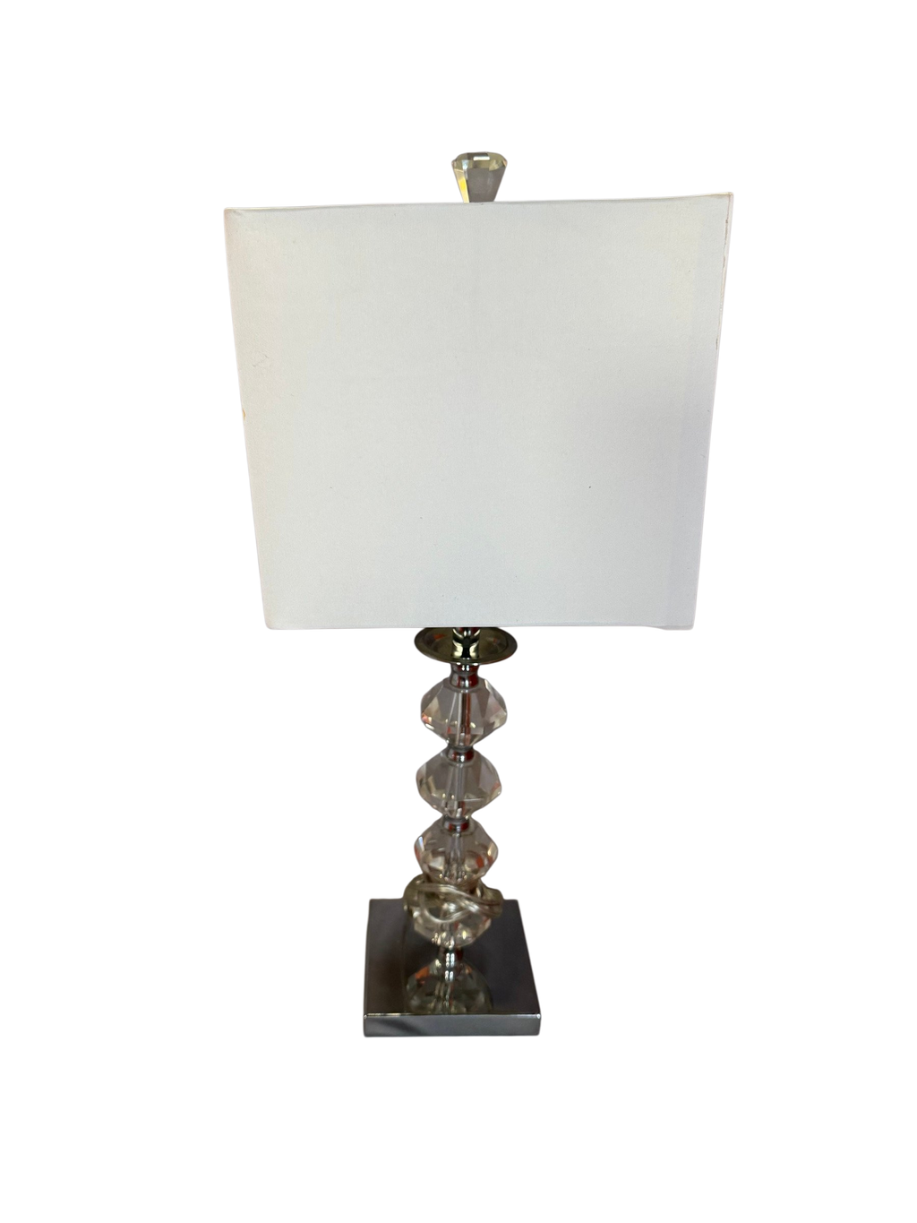 Table lamp with faceted crystal-look stem, chrome base and white rectangular shade