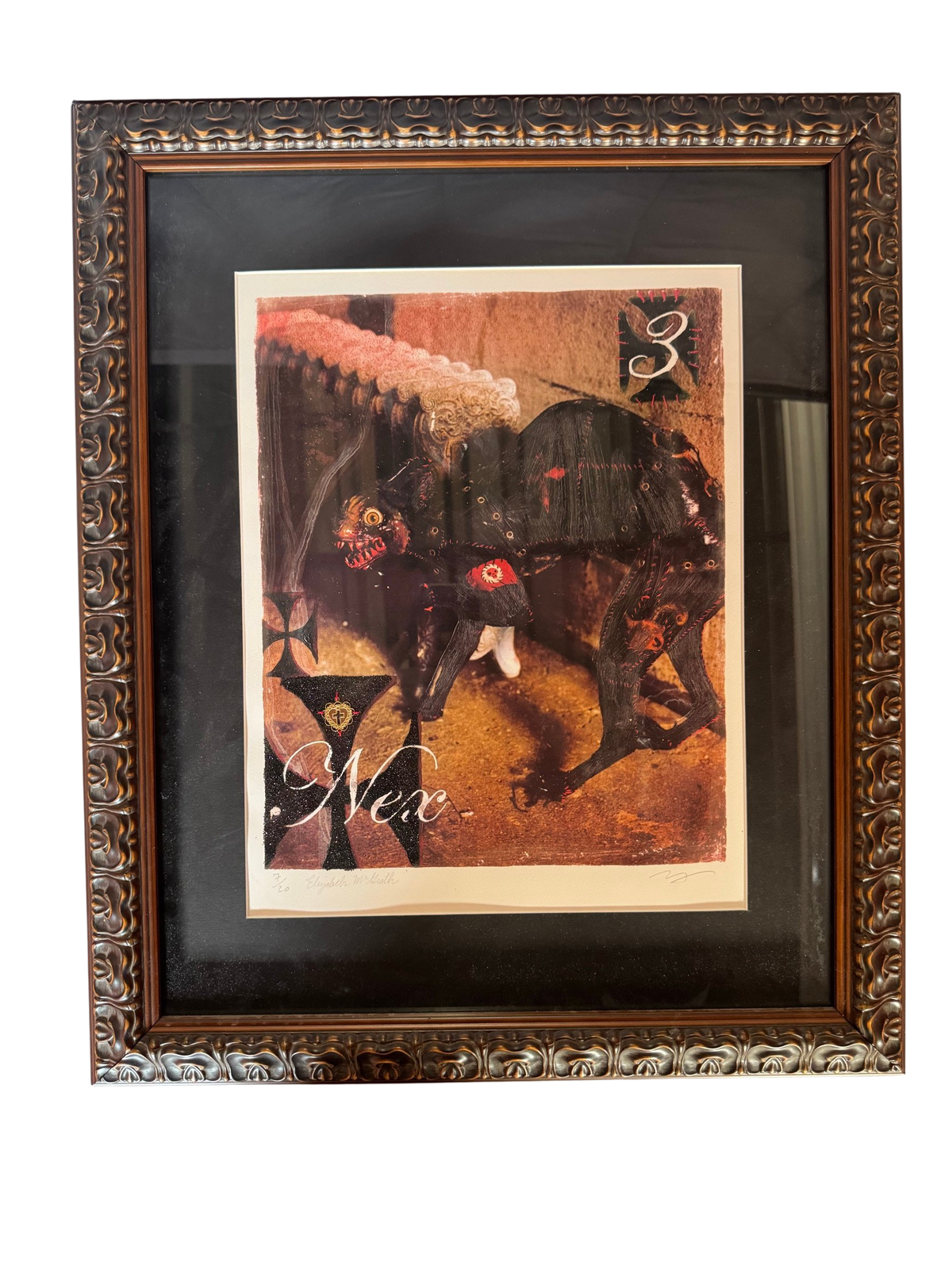 Framed Nex print in an ornate frame, straight-on