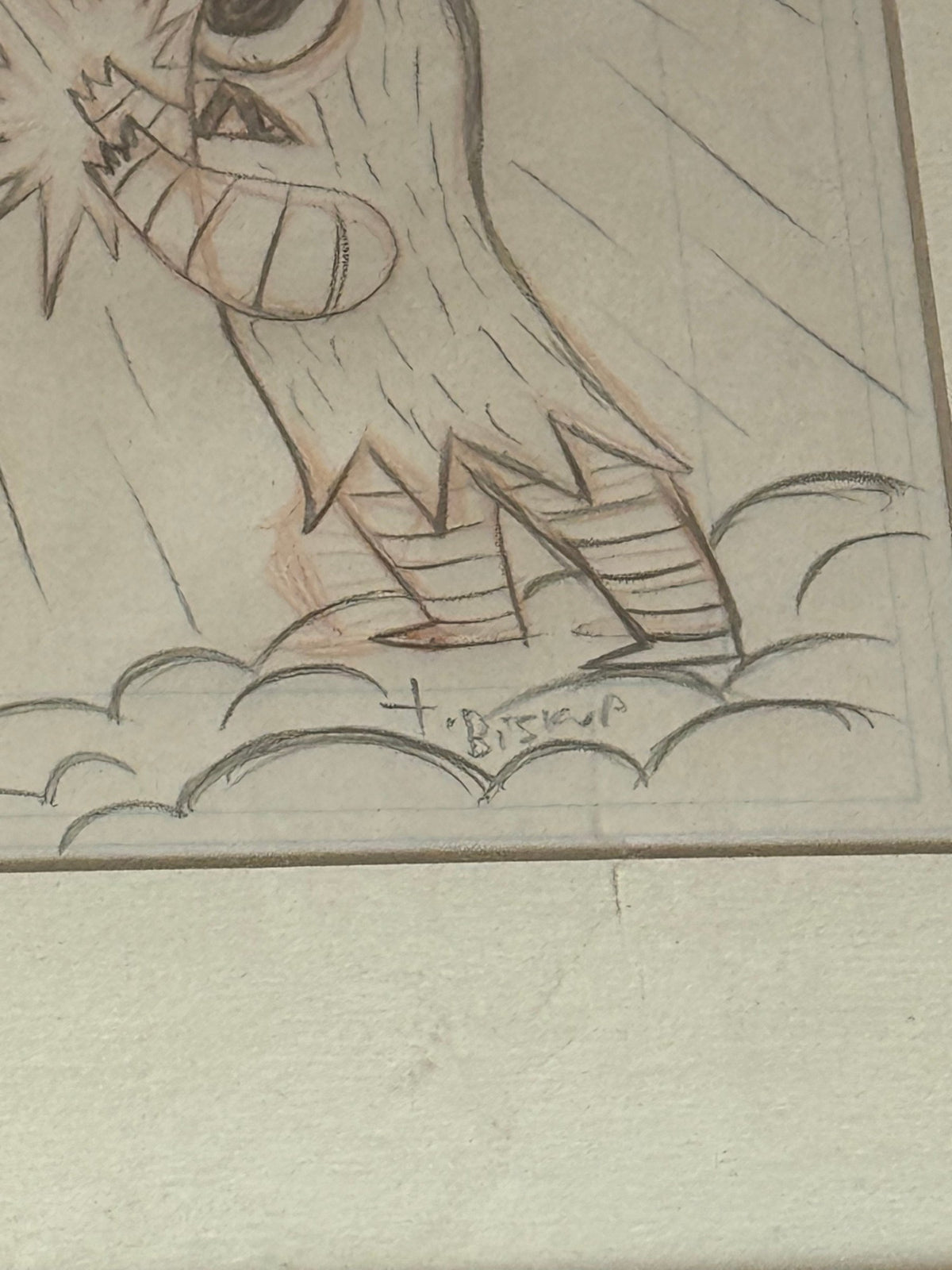 Close view of the pen signature below the image, lower right
