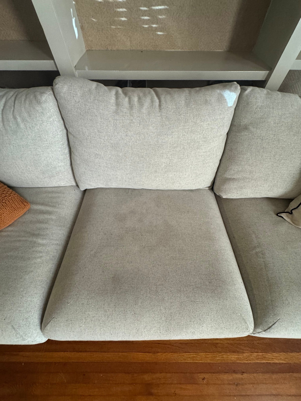 Close view of the seat cushion showing light marks