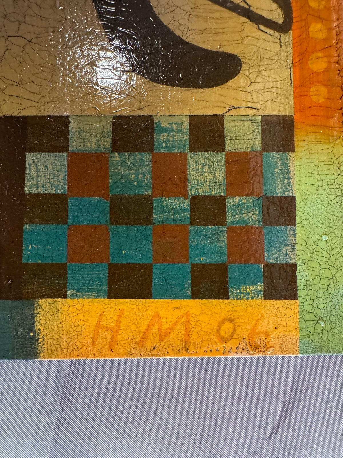 Checkerboard border and HM 06 initials