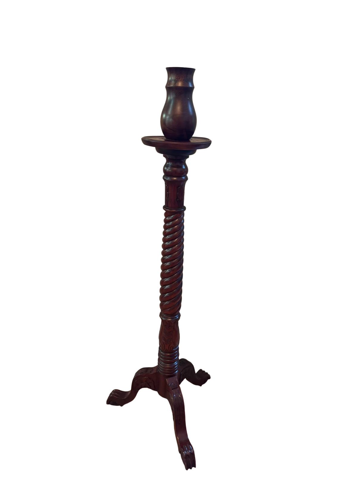 Tall carved wood pedestal candle stand with barley twist column and tripod claw feet base.