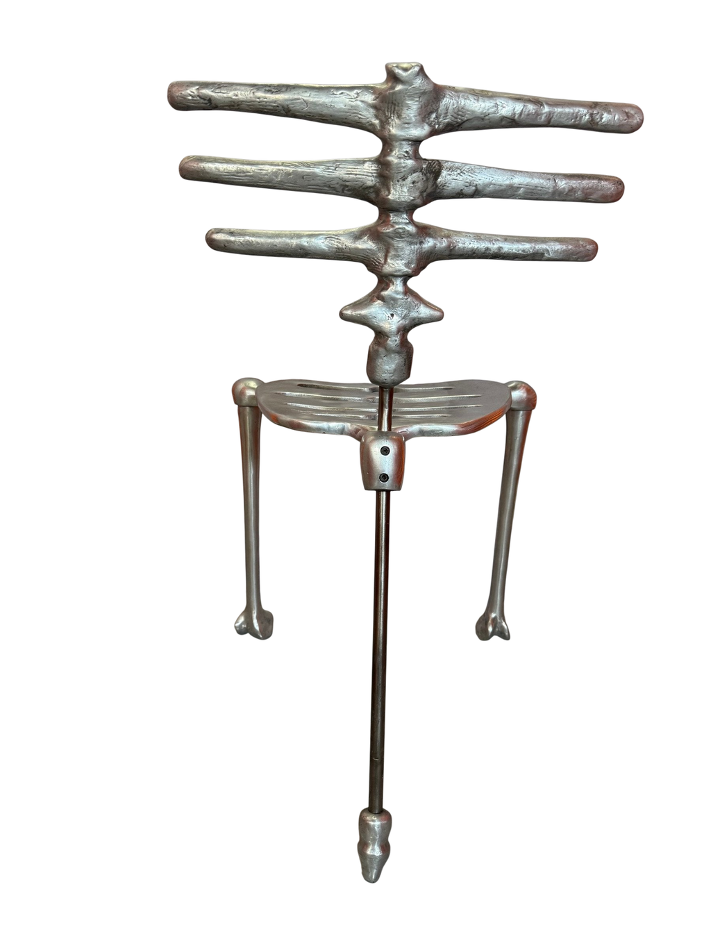 Skeleton chair rear view showing the spine and center rod