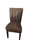 Taupe microsuede Parsons accent chair with dark wood legs in room corner