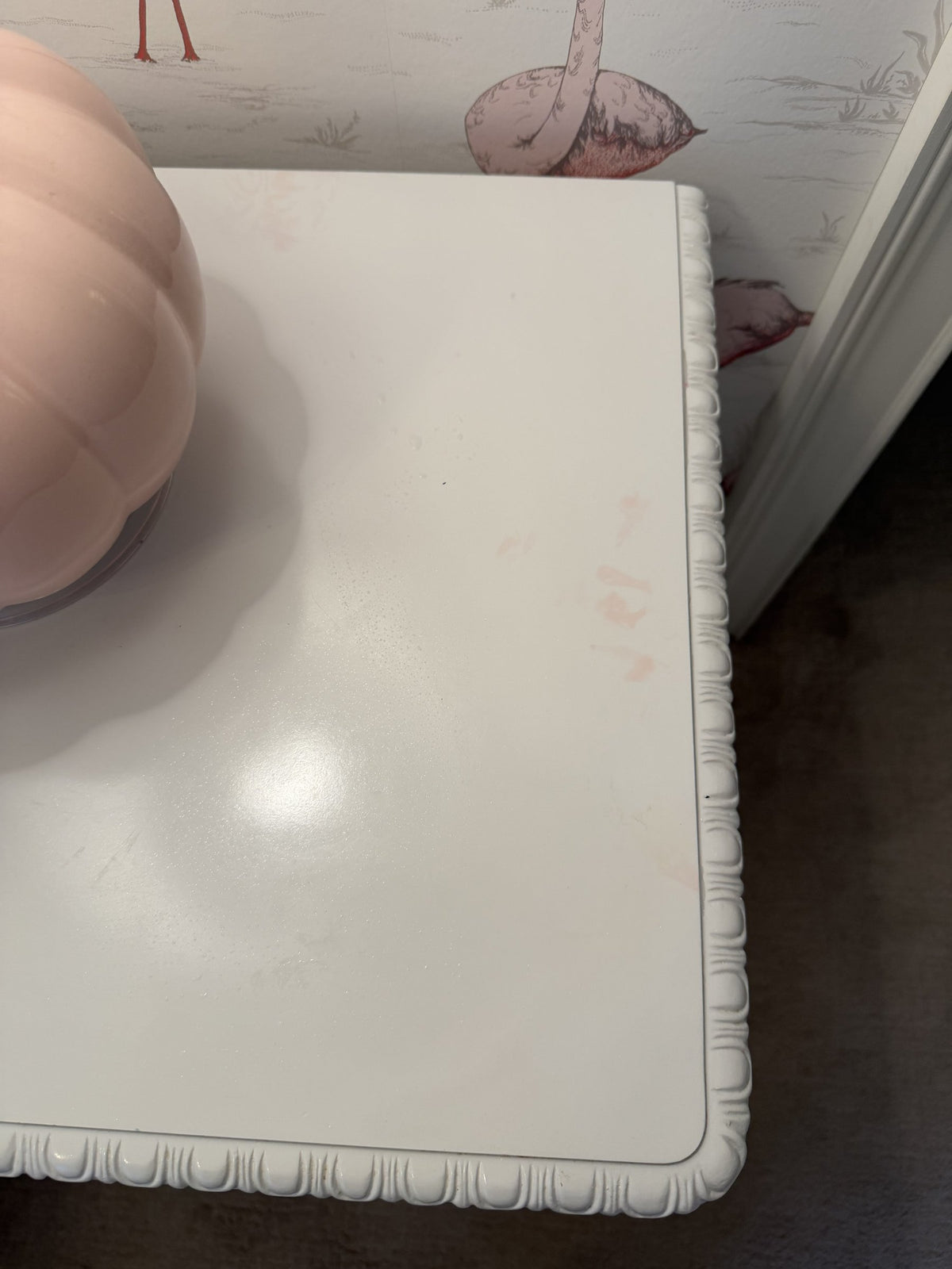 Faint marks on the nightstand top