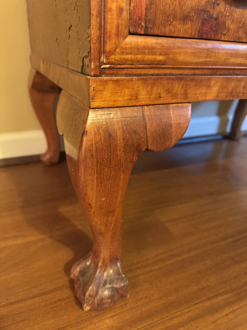 Slant front and drawer fronts showing mismatched figured maple