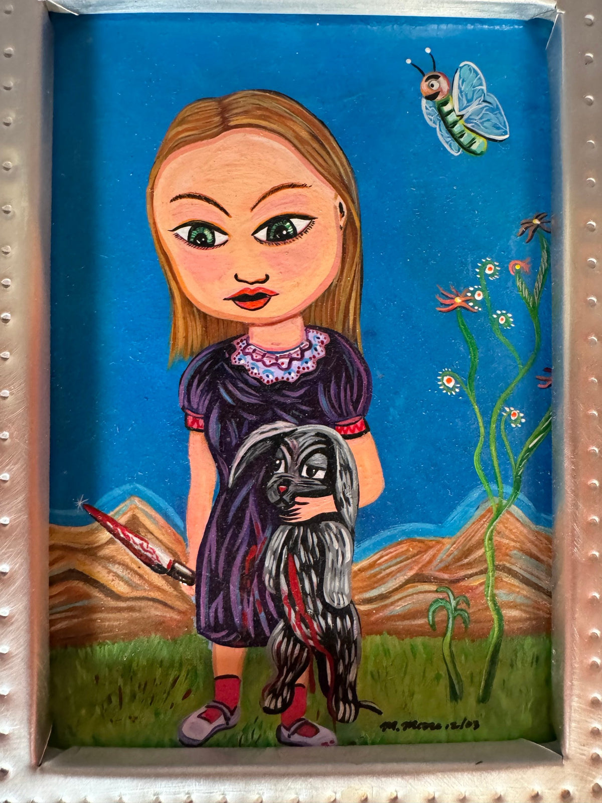 Close view of the girl holding a dog